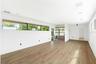 Second floor media room with access to private balcony