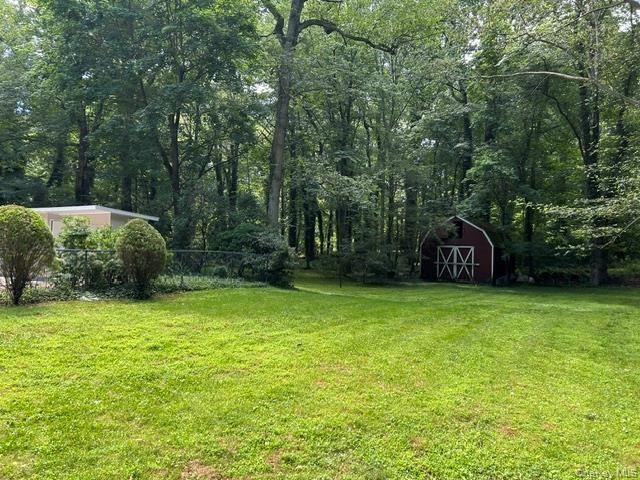 Tree filled acreage surround the home