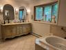 The main bathroom was designed to be a personal spa