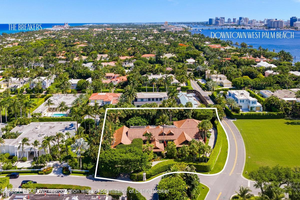 Aerial View of single story over 8,000 Sf home sited on a .78 acre lot.