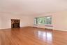 Stone fireplace.  Oak hardwood floors.