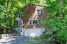 Generously-sized home, with oversized 2-car garage and multi-car driveway.