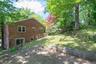 Fully fenced back yard convenient for pets and family.