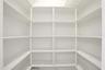 Pantry enclosed by glass doors
