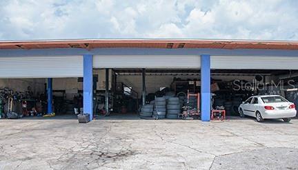 3 large overhead garage doors