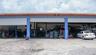 3 large overhead garage doors