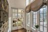 Entryway with dark hardwood / wood-style floors