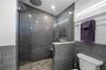 Beautiful tiled shower with rainfall shower head