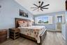 Primary suite occupies the entire 3rd story and is impressive with high vaulted ceilings and large windows.