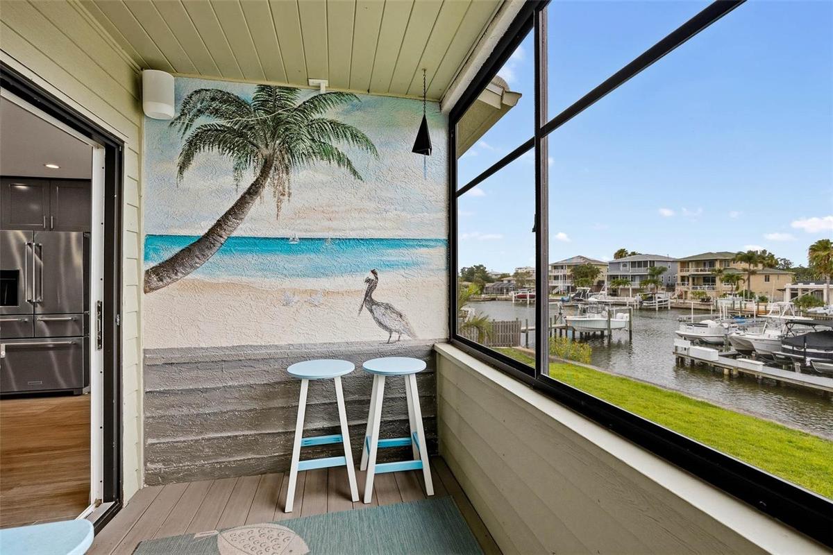 Main level screened balcony.