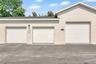 Detached one-car garage. White square outlines location of garage.