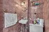 Half bath with tile walls