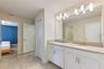 Connecting bath between theme rooms