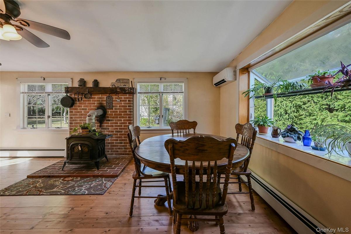 Den with wood burning stove