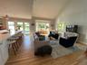 Open light filled living room with high vaulted ceiling