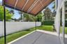 Deck with awning in side yard