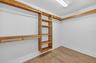 Spacious walk-in closet in primary suite