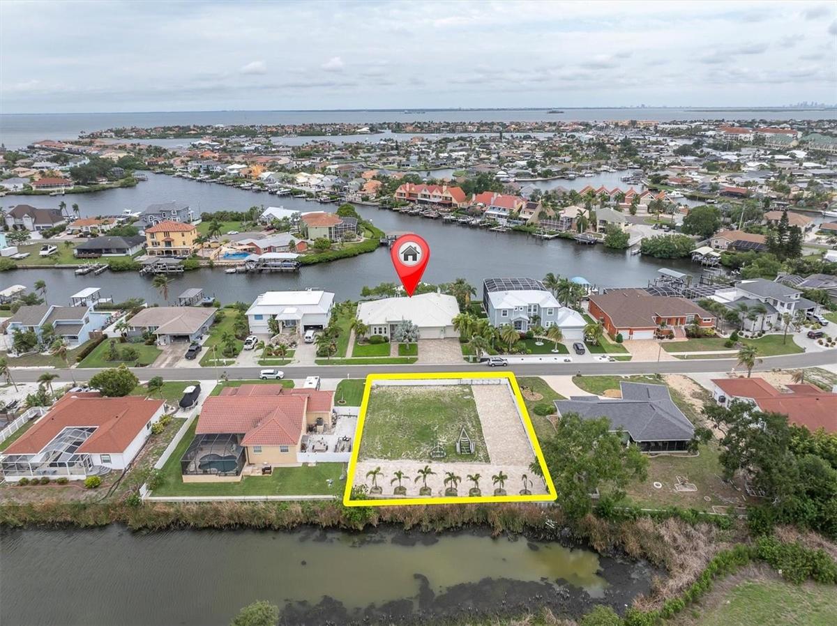 Aerial w/ vacant lot