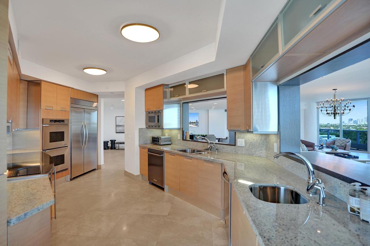 Chef's kitchen with stainless steel appliances, sleek cabinetry, plentiful storage, extra prep sink and under sink reverse osmosis water purifier