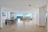 Light & Bright Great Room Floor to Ceiling Walls of Windows