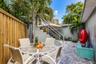 Courtyard includes 2 dining areas, fountain, game room, gazebo, firepit, BBQ, hot tub