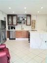 #1 Downstairs Left - has private patio and partial views of the Bay