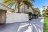 Gated courtyard leads to laundry, dining areas, fountain, gazebo and hot tub.