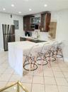 #1 Downstairs Left - has private patio and partial views of the Bay