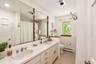 Bathroom shown with white walls-virtually retouched