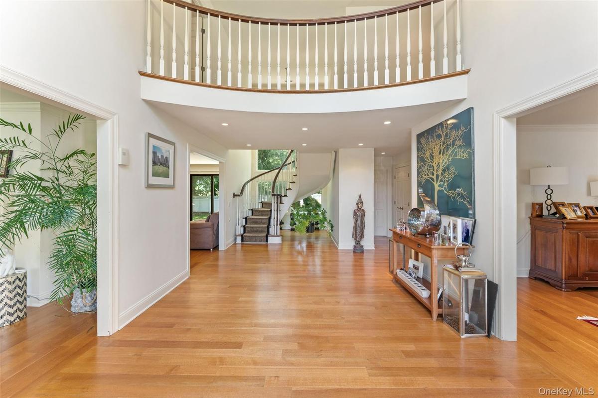 Dramatic entrance foyer welcomes you into the home