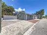 Private Parking Pad - Access from Alley