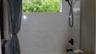 MAIN BATHROOM SHOWERUpdated main bathroom shower showcases modern finishes and a clean contemporary design. Wilton Manors home for sale, heated saltw