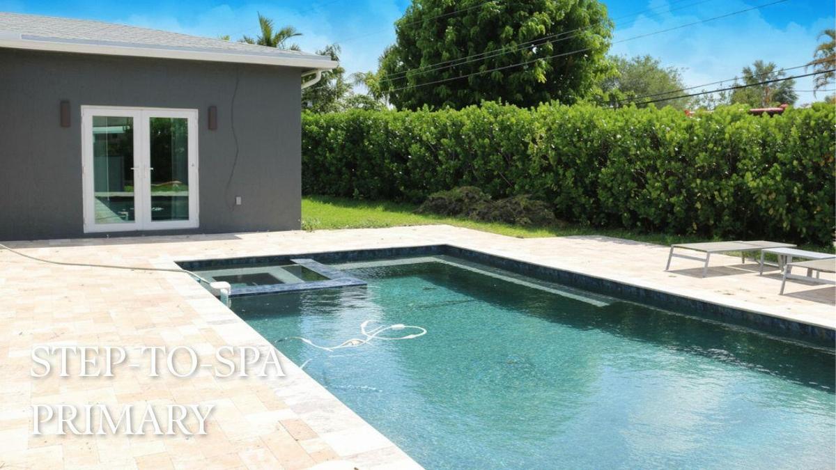 STEPS TO PRIMARY SUITE & HEATED SALTWATER POOLPrivate pathway from the primary suite leads directly to the heated saltwater pool, creating a true res