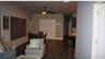 ENTRY TO LIVING ROOM FROM GARAGEConvenient access from the garage opens directly into the spacious living area, offering a seamless transition for da