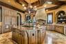 Kitchen with a grand island perfect for hosting & entertaining!