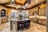 Kitchen with a grand island perfect for hosting & entertaining!