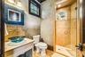 Bathroom with easy access to pool area.
