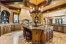 Kitchen with a grand island perfect for hosting & entertaining!
