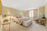 The Master bedroom is a palatial paradise, spacious and with light and airy breezes from the oversized windows.