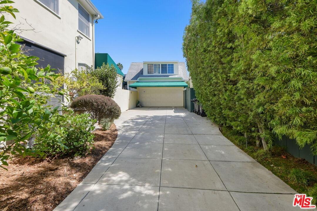 Gated driveway to garage