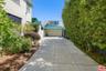 Gated driveway to garage