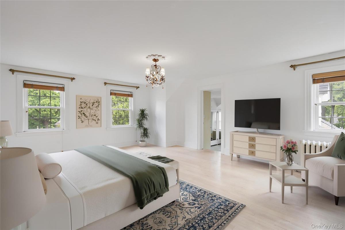 Spacious primary bedroom with bath