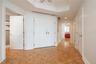 Foyer, Half Bath on left, Second Bedroom on right