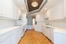 Kitchen -- Laundry room through the open door