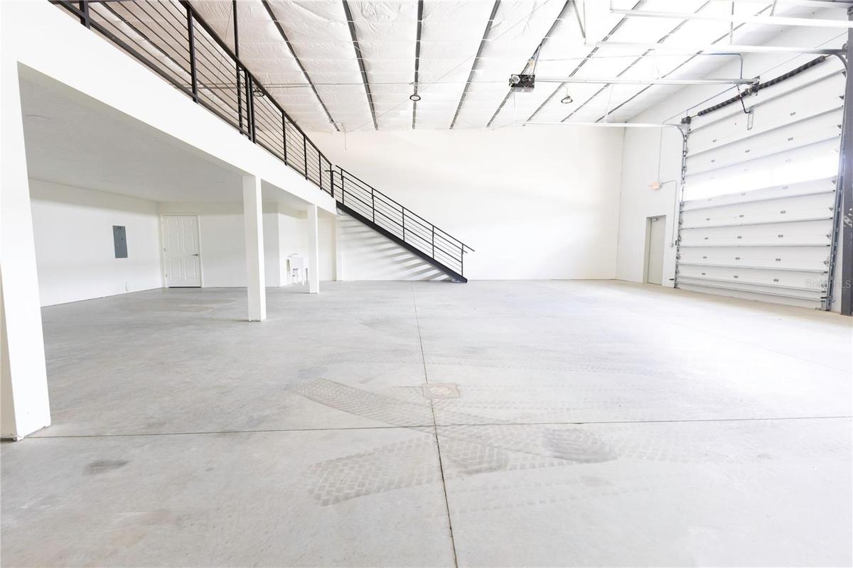 Stairs leading to upper storage space