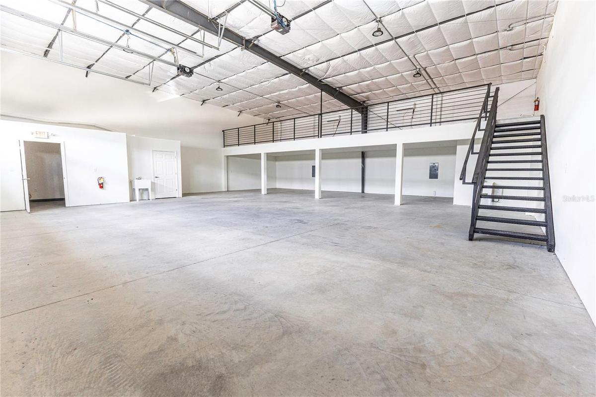 Stairs leading to upper storage space