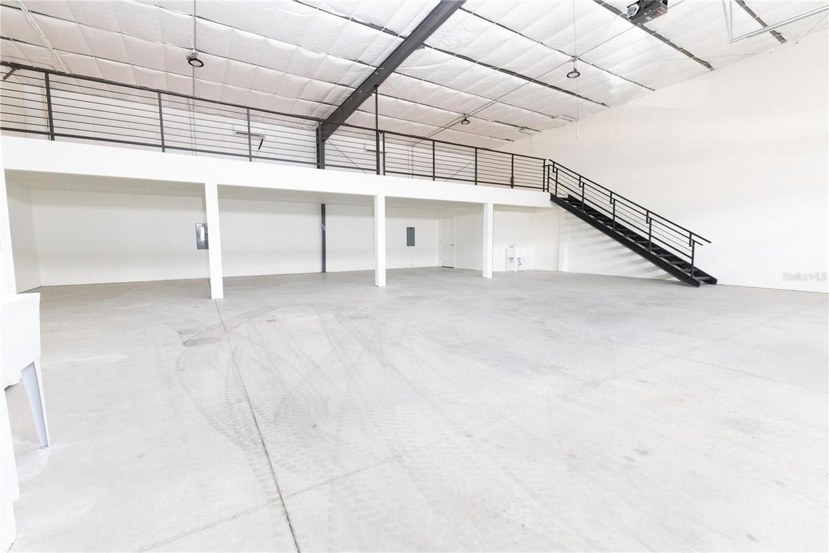 Stairs leading to upper storage space
