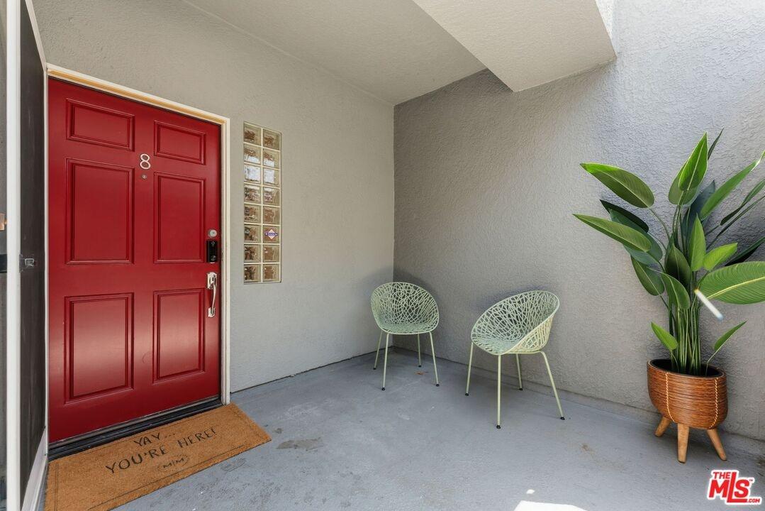 Exterior unit entry with a red