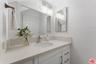 Bathroom featuring a white van