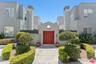 Grey stucco multi-unit buildin